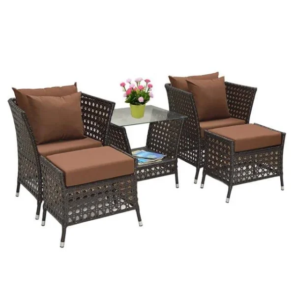 Dark brown outdoor rattan furniture set with cushions on a patio