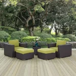 5-piece patio conversation set featuring a dark brown frame and green cushions, including two chairs, a loveseat, and a coffee table, perfect for outdoor seating.