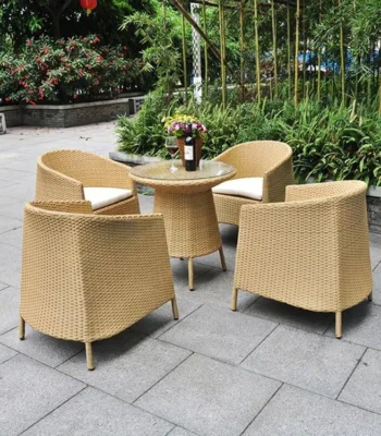 5-piece beige and white rattan patio conversation set with sofa, chairs, and table