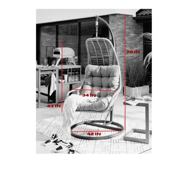 Single seater hanging swing with stand in black and beige, perfect for balcony or garden relaxation.