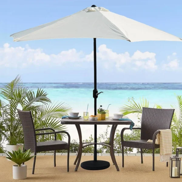 9ft off-white outdoor patio umbrella with center pole stand in a garden setting