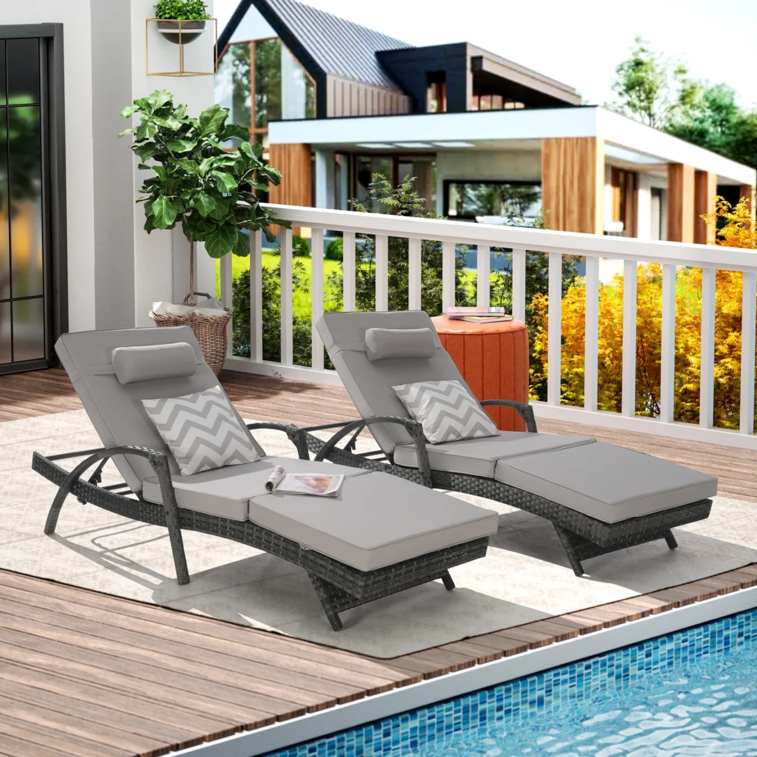 Set of 2 long reclining outdoor wicker chaise lounge chairs with cushions, perfect for patio or garden.