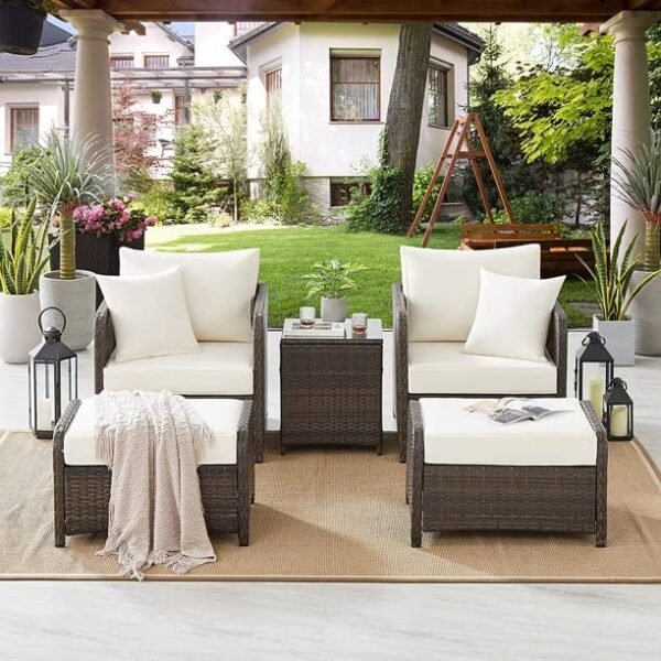 Modern outdoor patio set with stylish seating and center table, perfect for garden or balcony.