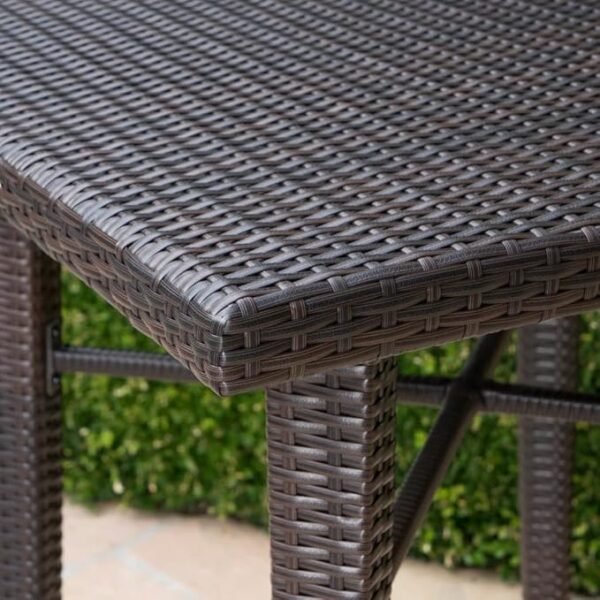 5-piece outdoor wicker bar set with stools and table, ideal for backyard and poolside gatherings.