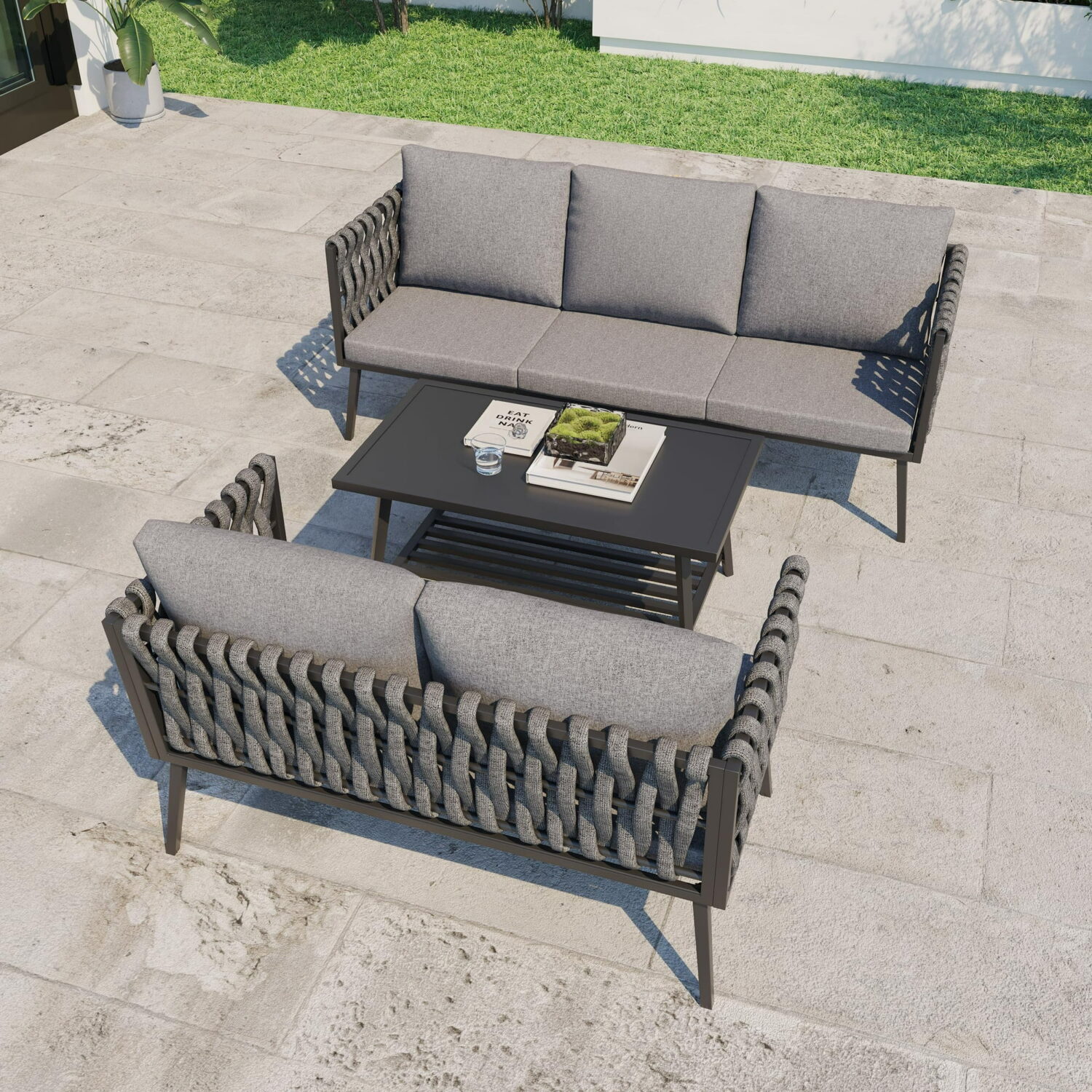 Grey 3-piece outdoor woven rope bistro set with table and chairs on patio