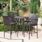 Entertain in style with this elegant 5-piece outdoor wicker bar set — perfect for backyard gatherings and poolside lounging.