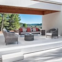 Elegant grey rope sofa set with center table, perfect for outdoor patio or garden seating.