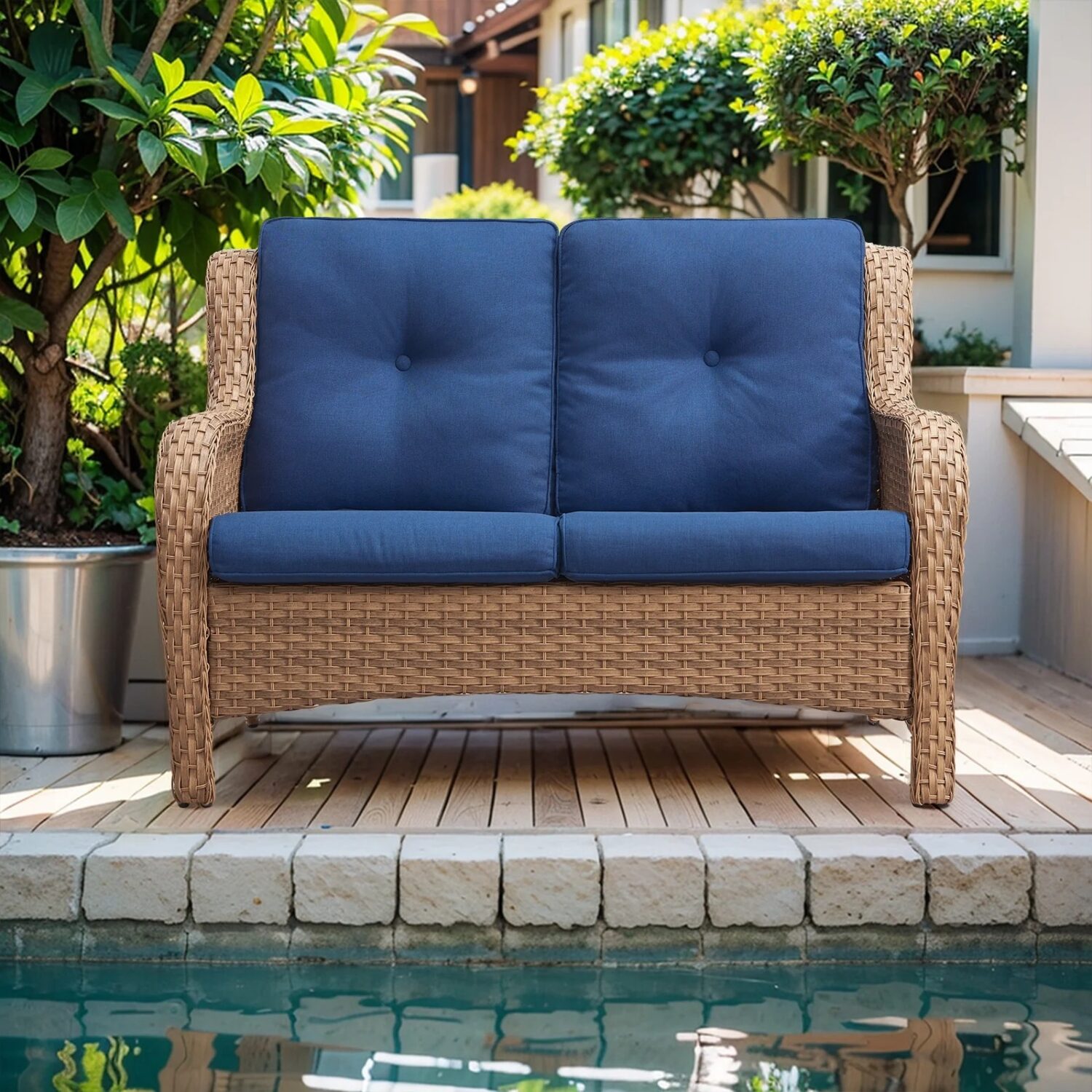 Double seater rattan wicker sofa with soft cushions for patio or garden seating