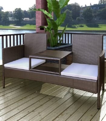 Dark brown 2-seater patio sofa set with tea table, made of durable poly rattan, placed outdoors on a garden deck.