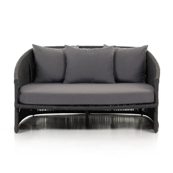 Black outdoor patio rope daybed for garden, terrace, balcony, and poolside lounging, made with rattan and durable rope.
