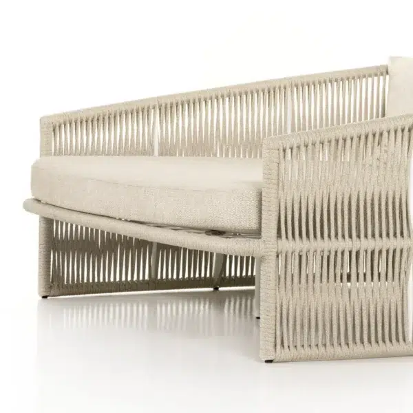 Beige outdoor rope daybed with rattan design, perfect for garden, terrace, balcony, or poolside relaxation.