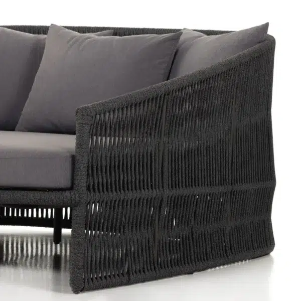 Black outdoor patio rope daybed for garden, terrace, balcony, and poolside lounging, made with rattan and durable rope.