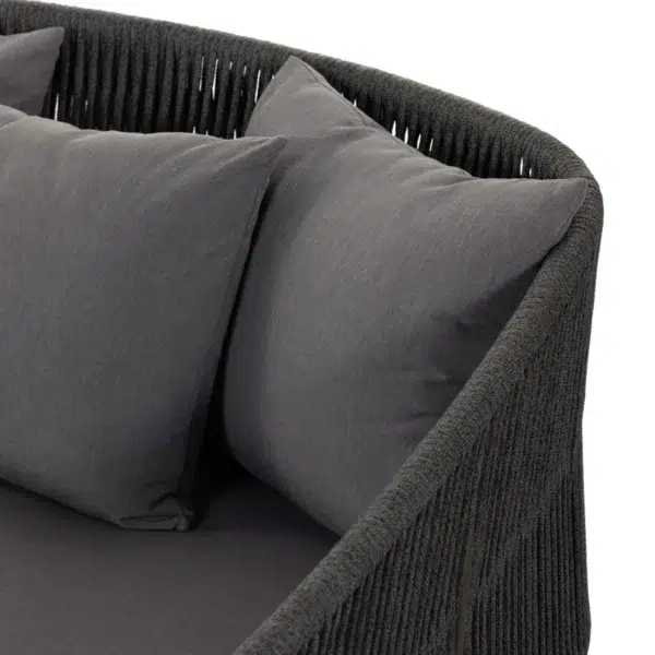 Black outdoor patio rope daybed for garden, terrace, balcony, and poolside lounging, made with rattan and durable rope.