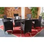 6-person round outdoor dining set with comfortable black cushions, perfect for patio, garden, or backyard.