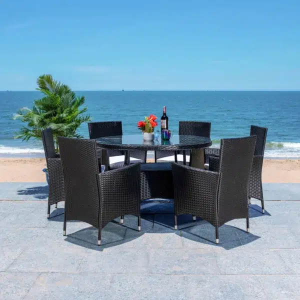 6-person round outdoor dining set with comfortable black cushions, perfect for patio, garden, or backyard.