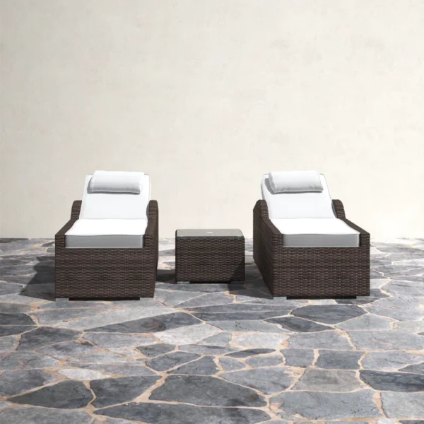 Rattan wicker long reclining outdoor chaise lounge in brown and off-white with cushions.