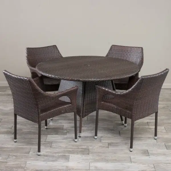4-person round outdoor dining set with comfortable cushioned seats in garden/patio setting