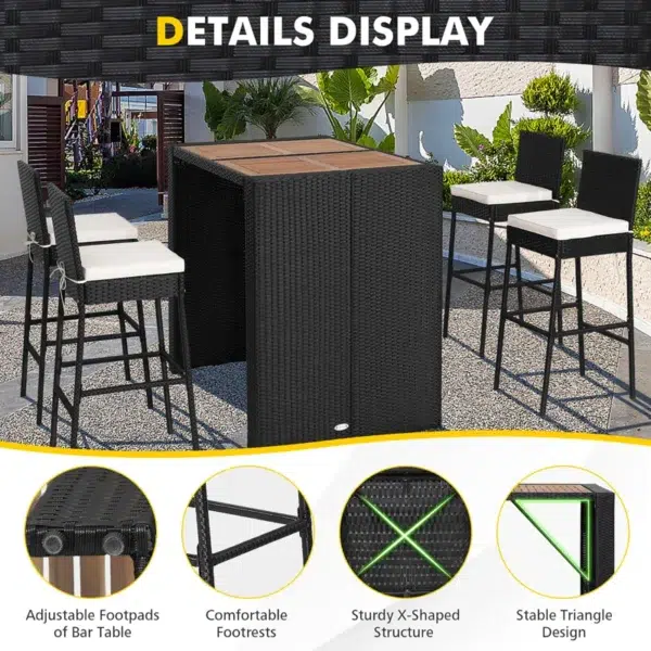 5 piece outdoor patio rattan bar set in black and white with high chairs and a bar table arranged on a garden patio.