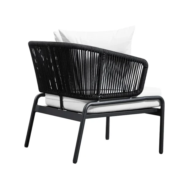black and white modern outdoor rope sofa set with woven design in garden setting