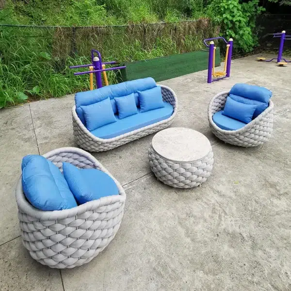 Outdoor 5-seater rope weaving sofa set in light grey and blue with cushioned seating.