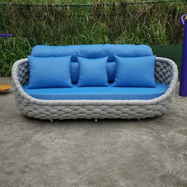Outdoor 5-seater rope weaving sofa set in light grey and blue with cushioned seating.