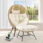 Beige single seater swing basket with ottoman for balcony and garden relaxation