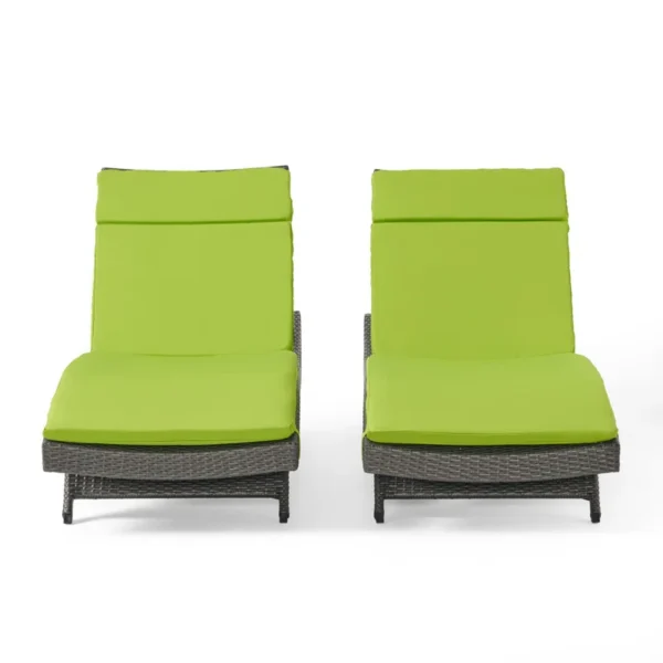 Pair of dark brown and green outdoor patio recliner lounger chairs with all-weather cushions.