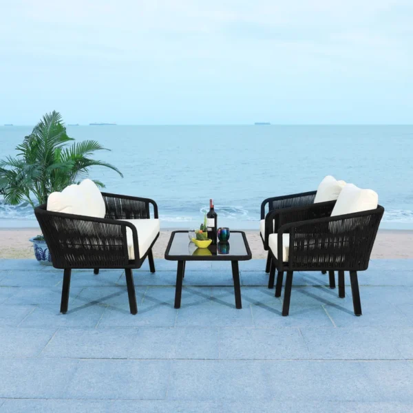 Black and white outdoor rope sofa set with matching center table, perfect for garden or patio