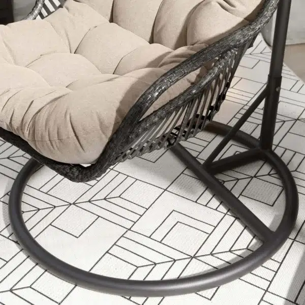 Single seater hanging swing with stand in black and beige, perfect for balcony or garden relaxation.