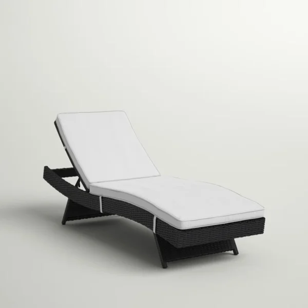 Off-white wicker rattan outdoor patio chaise lounge chair with cushioned seating.
