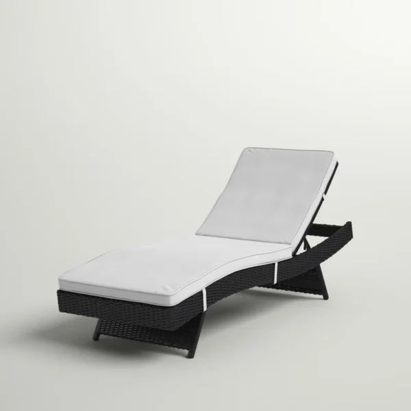 Off-white wicker rattan outdoor patio chaise lounge chair with cushioned seating.