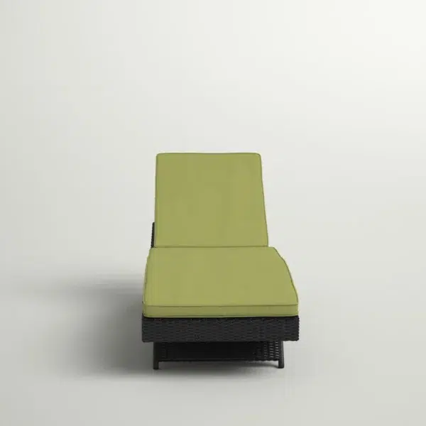 Green wicker rattan outdoor patio chaise lounge chair with cushioned seat.