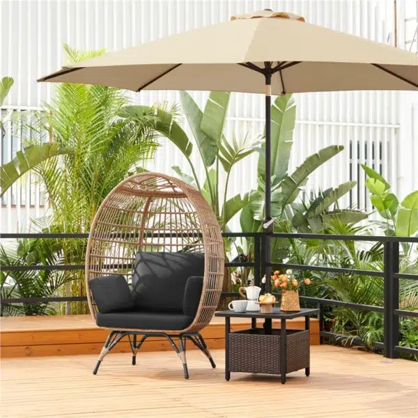 Single seater swing basket in beige and black, ideal for balcony or garden seating.