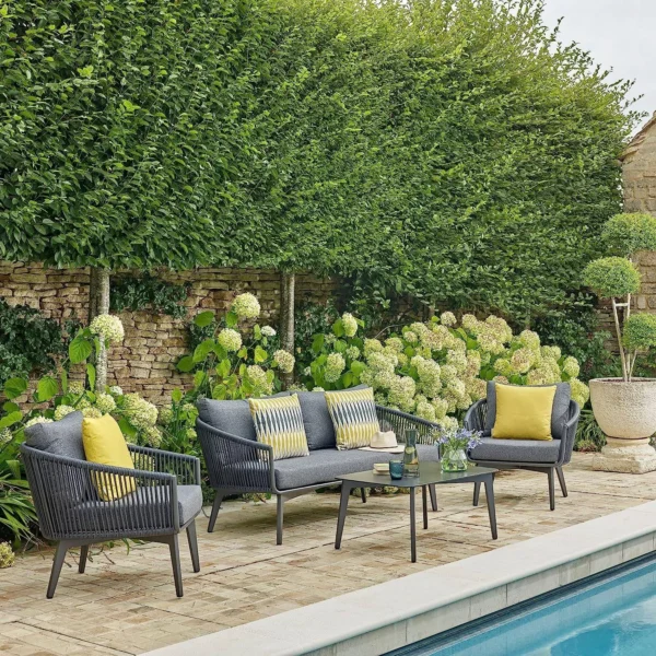 "Bring comfort and style to your patio or balcony with the Unique Design Rope Bistro Set. This 4-piece set includes two ergonomically designed chairs and a compact table, all crafted with durable rope detailing and a sleek grey finish. Ideal for small outdoor spaces, it combines modern aesthetics with practical functionality, making every coffee break or meal an inviting experience."