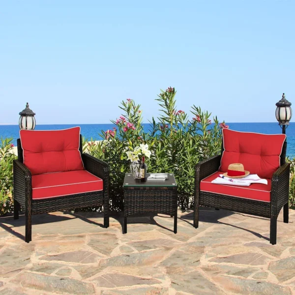 3-piece rattan wicker patio furniture set with dark brown frame and red cushions, including two chairs and a small table