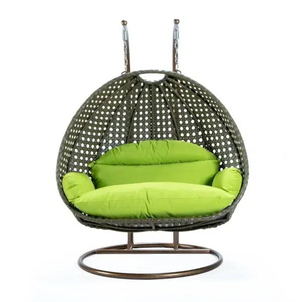 "Outdoor egg chair swing in dark green and light green cushions, perfect for garden or balcony seating"