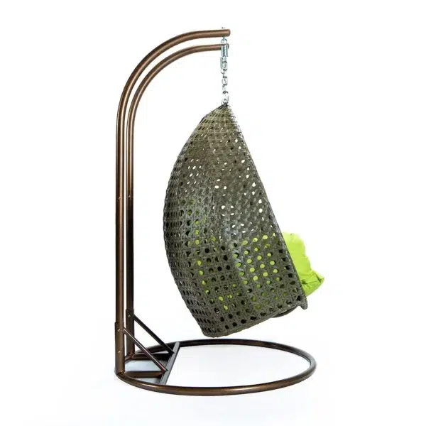 "Outdoor egg chair swing in dark green and light green cushions, perfect for garden or balcony seating"