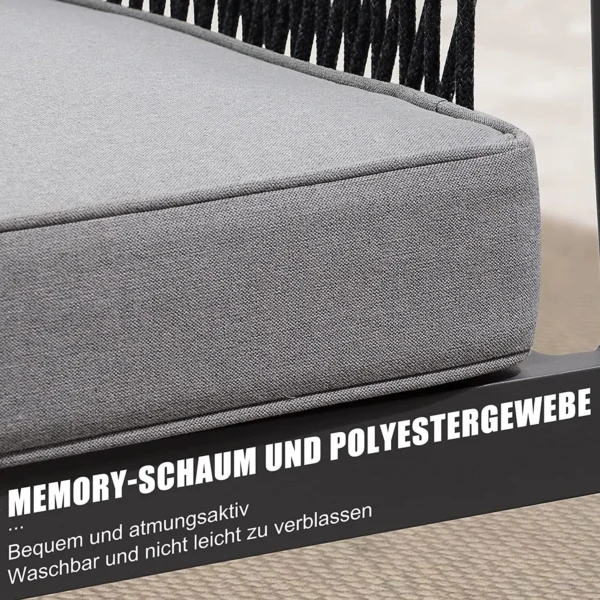 Grey 4-seater outdoor sofa set with plush cushions and matching table on a patio.