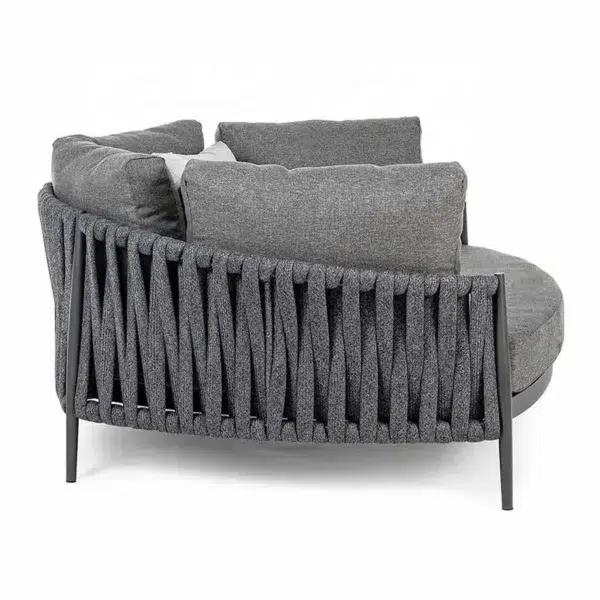 grey outdoor braided rope daybed on a patio with cushions