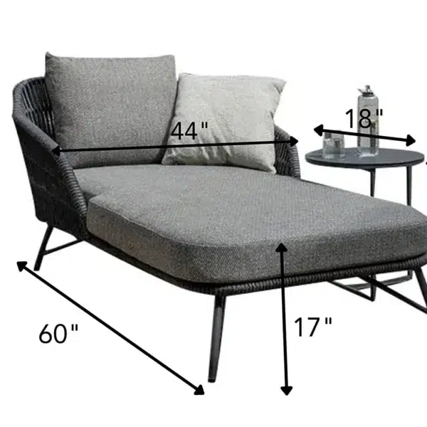 Grey rope daybed set with round outdoor sofa, matching side table, and sun lounger on patio