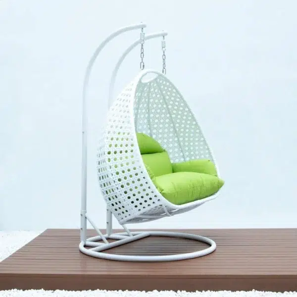 Light green and white swing chair with a sturdy stand and cushioned seat, perfect for indoor and outdoor relaxation.