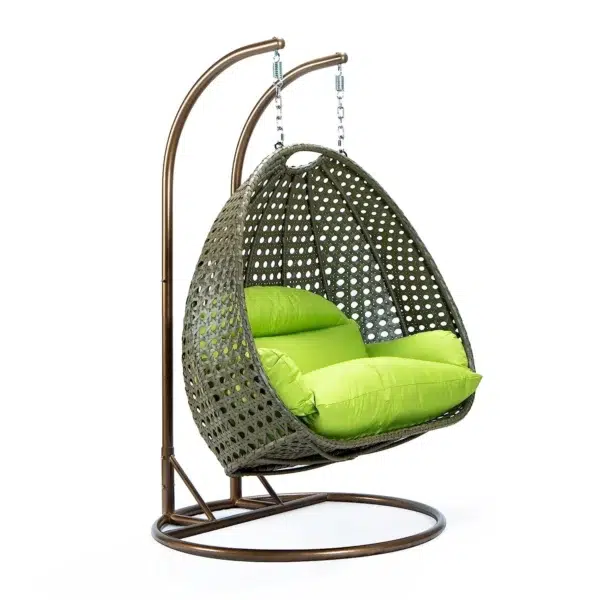"Outdoor egg chair swing in dark green and light green cushions, perfect for garden or balcony seating"