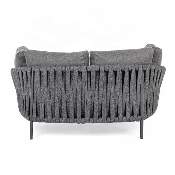 grey outdoor braided rope daybed on a patio with cushions