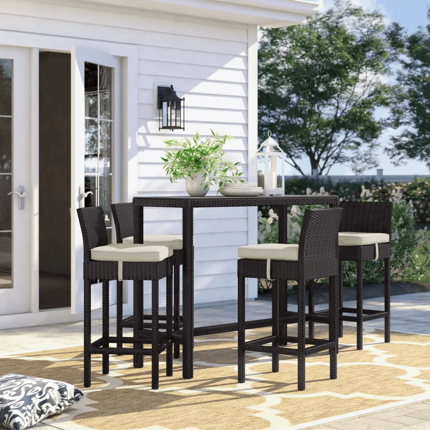 5 piece outdoor patio wicker dining bar set in dark brown and off-white with chairs and table.