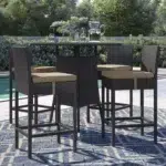 5-piece elevated patio bar set in dark brown wicker with beige cushions, ideal for outdoor entertaining.
