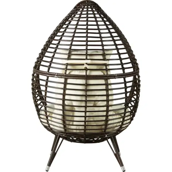 Brown single seater swing basket hanging in balcony with cushions.