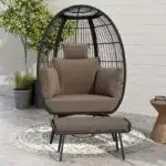 Black double -seater swing basket with ottoman, perfect for balcony and garden seating.