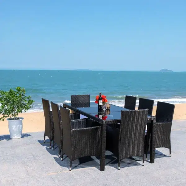 8-person rectangular outdoor dining set with black frame and off-white cushions