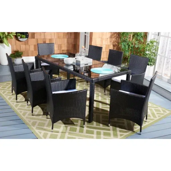 8-person rectangular outdoor dining set with black frame and off-white cushions