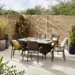 6-person dark brown PE rattan outdoor dining set with glass tabletop for garden or patio